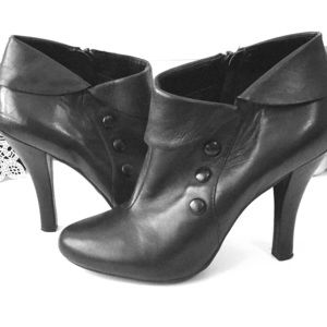 Black booties with button detail